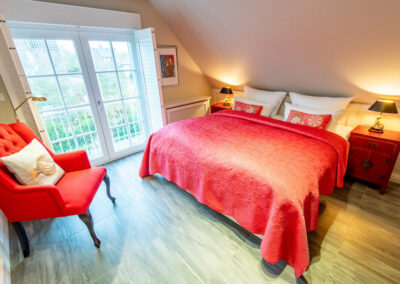 Schlafzimmer mit Doppelbett im Ferienhaus Rosenhus in Westerland auf Sylt